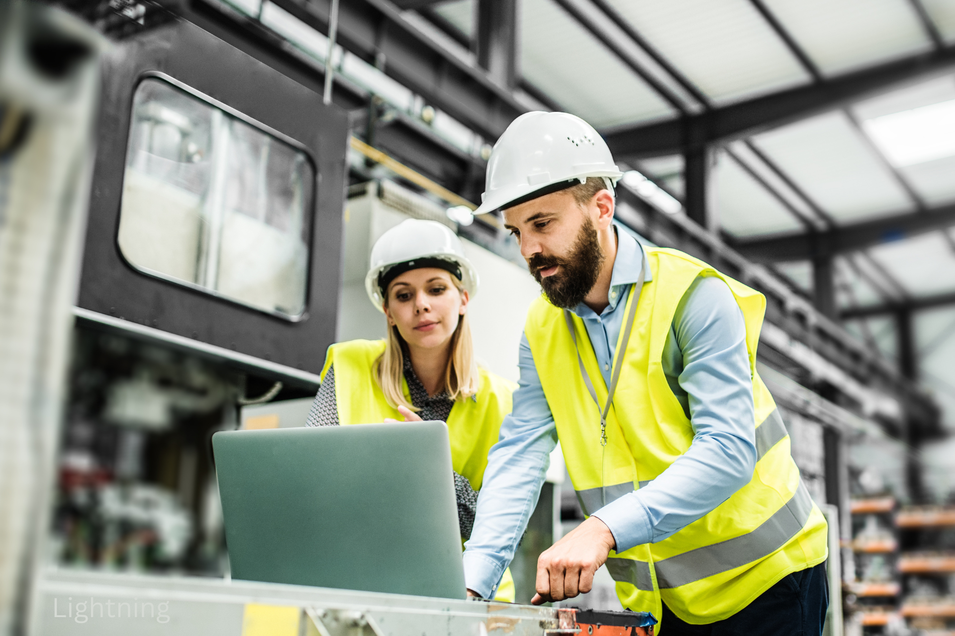 Industrial operators reviewing data on site — execution and scale-up context